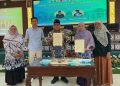 Cik Gu Siti dari Malaysia dalam Stadium Generale Internasional Unisma sebagai Tuan Rumah