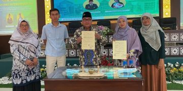 Cik Gu Siti dari Malaysia dalam Stadium Generale Internasional Unisma sebagai Tuan Rumah